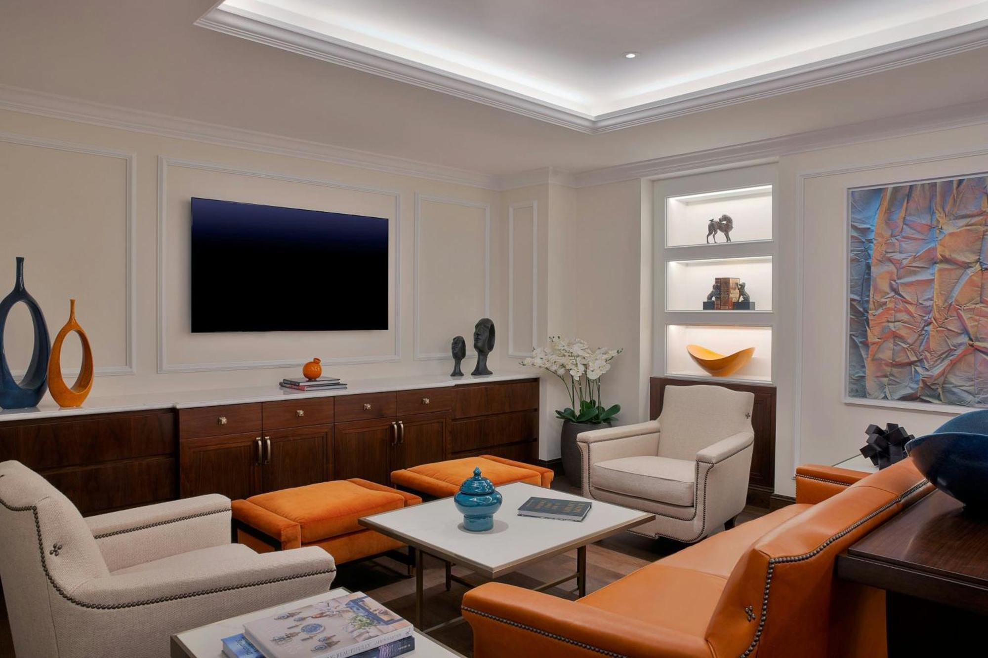 The Ritz-Carlton, Amman Hotel Bagian luar foto A living room with indirect lighting